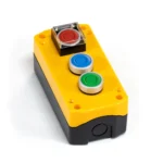 Maple Systems PB01003B - Triple yellow pushbutton control box with flip top button protector installed