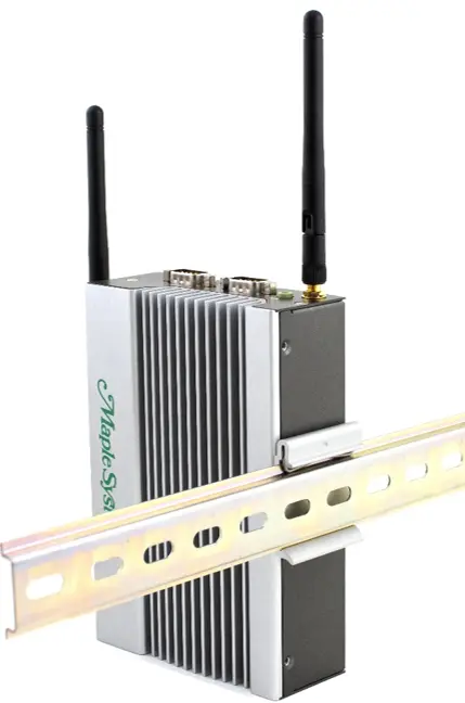 IPC2610A with DIN bracket installed Rear perspective view of an IPC2610A industrial box PC attached to a DIN rail with a mounting bracket. The image highlights the DIN rail installation method, fanless finned chassis, and dual wireless antennas.