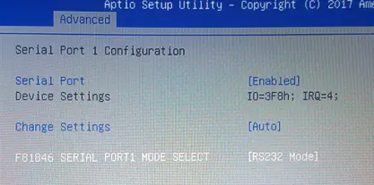 Screenshot of the Aptio Setup Utility Serial Port 1 Configuration menu showing serial port settings, including enable/disable status, device settings, and communication mode selection.