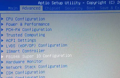 Screenshot of the Aptio Setup Utility Advanced menu showing system configuration options, including CPU, power, ACPI, Super I/O, hardware monitor, network, and USB settings. The Super I/O entry is selected