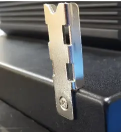 Close-up of a panel mounting bracket attached to the side of a PC2300B Series industrial panel PC.