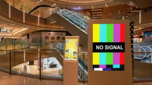 A Shopping Mall Kiosk displaying a "No Signal" message with test color bars.